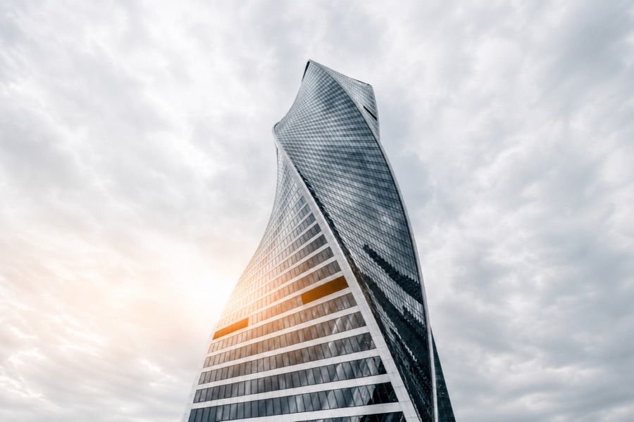 Landmark twisting glass tower against the sky